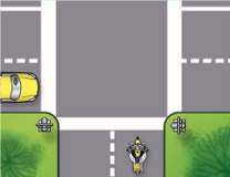 Image of a motorcycle at a small intersection